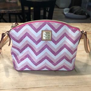Dooney & Bourke small purse. Shades of pink chevron print with leather strap